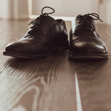 Sample photo, after: polished dark leather shoes with clean heels